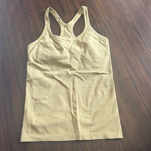 Lululemon Ebb to street tank top. Size 8. In great condition. Green/yellow color